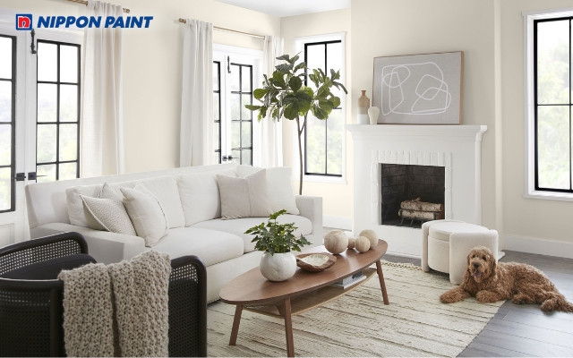 Phòng khách với sơn màu trắng sứ mang lại vẻ đẹp hiện đại và tinh tế, hợp mệnh 2004