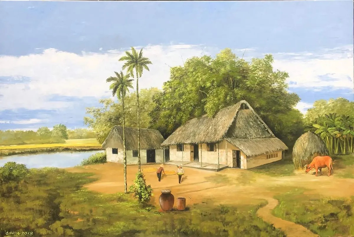 Phong cảnh làng quê Việt Nam với cánh đồng lúa và mái nhà cổ kính